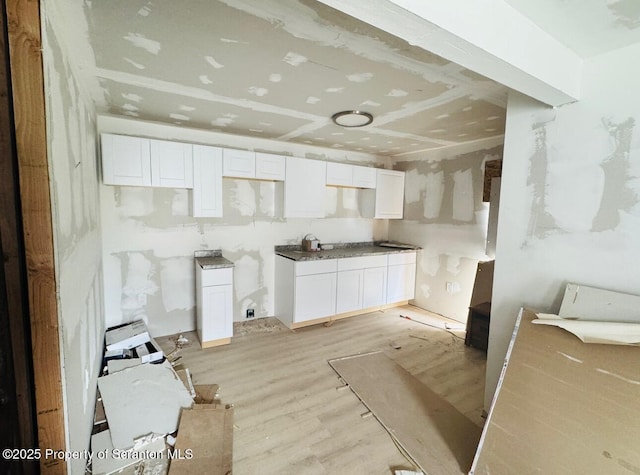 1537 Gardner Ave, Scranton, PA 18509 - kitchen with white cabinetry and light wood finished floors