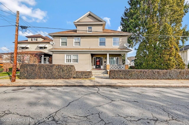 view of front property with covered porch