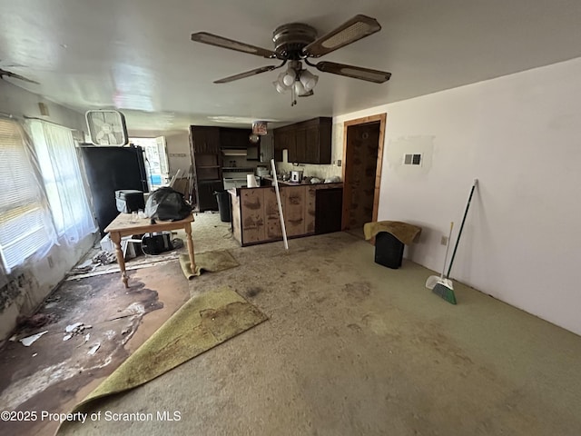 74 Matthews Rd, Spring Brook Twp, PA 18444 - living area with a ceiling fan and light colored carpet