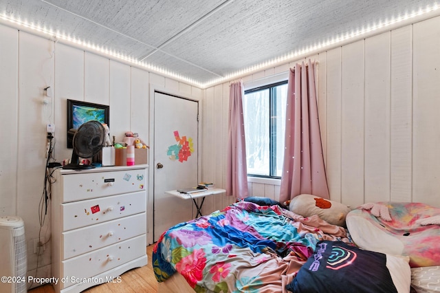 bedroom featuring wood-type flooring