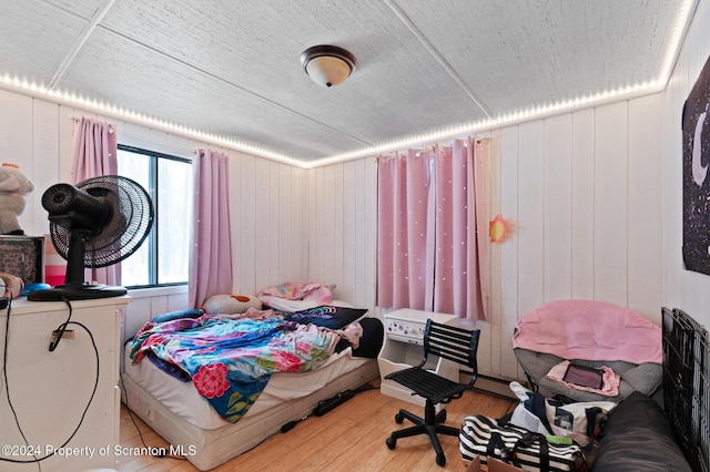 bedroom featuring wood-type flooring