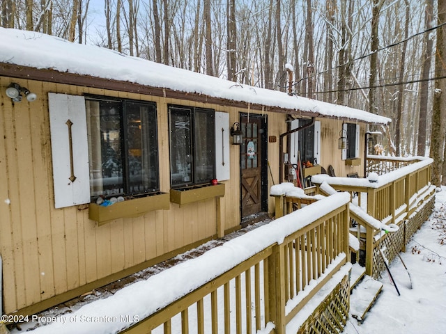 view of snow covered deck