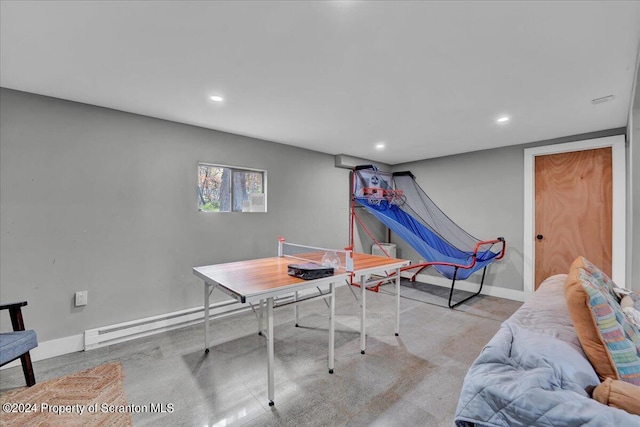 playroom featuring a baseboard radiator