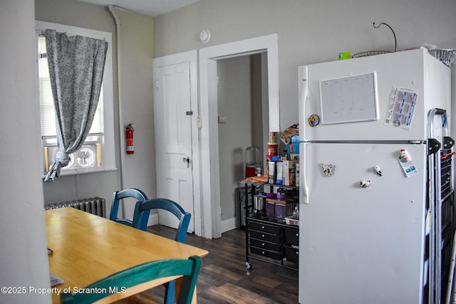 640 Alder St, Scranton, PA 18505 - dining room with radiator and wood finished floors