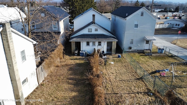 view of front of house with fence