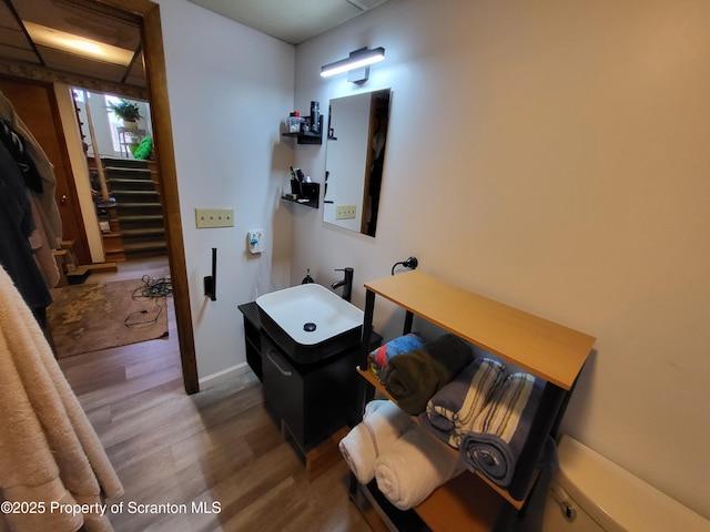 bathroom featuring wood finished floors
