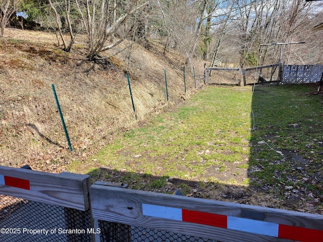 view of yard with fence