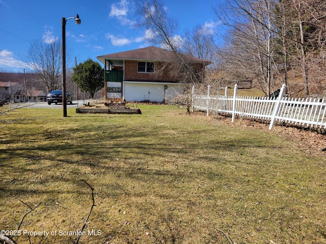 view of yard featuring fence
