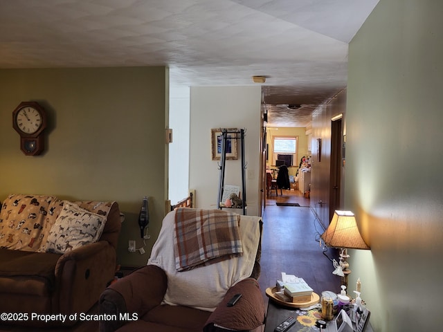 living area with wood finished floors
