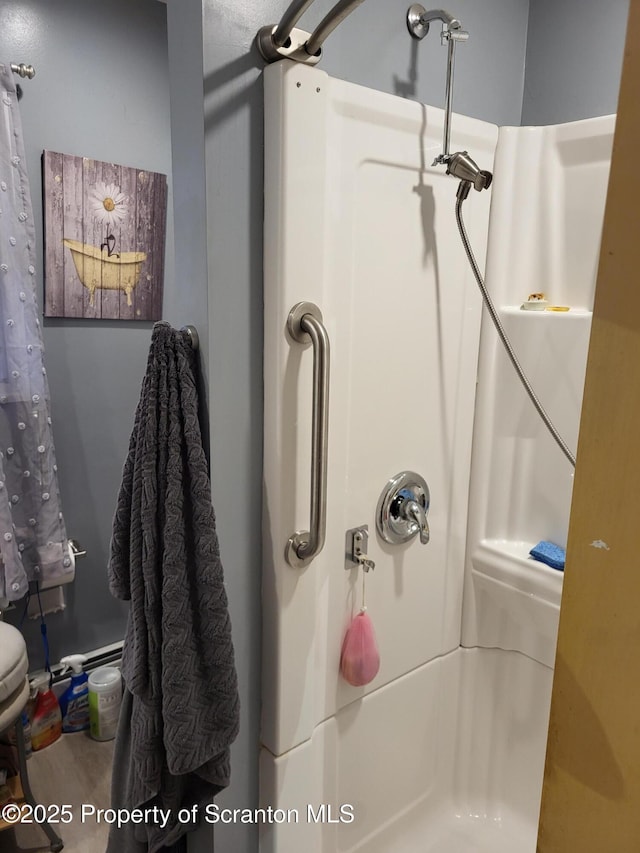 bathroom featuring walk in shower