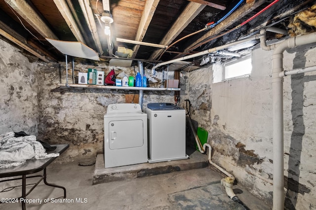 basement featuring washer and clothes dryer