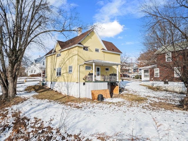 view of snow covered property