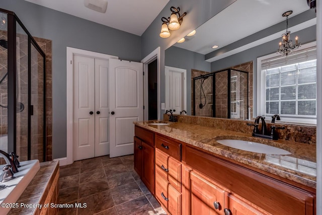 268 Winship Rd, Covington Twp, PA 18444 - bathroom with a stall shower, double vanity, a relaxing tiled tub, and a chandelier