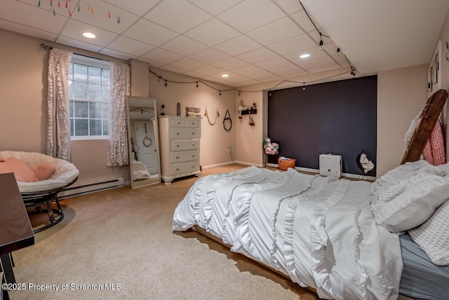 268 Winship Rd, Covington Twp, PA 18444 - bedroom with carpet, a baseboard heating unit, a drop ceiling, and recessed lighting