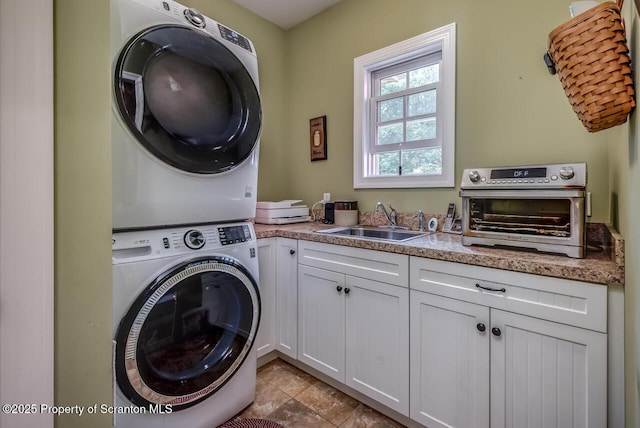 268 Winship Rd, Covington Twp, PA 18444 - laundry area with stacked washing machine and dryer and light tile patterned floors