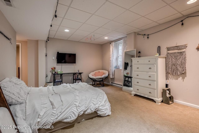 268 Winship Rd, Covington Twp, PA 18444 - bedroom with light colored carpet, a paneled ceiling, baseboard heating, and recessed lighting