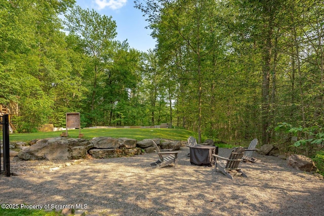 268 Winship Rd, Covington Twp, PA 18444 - view of green lawn with a fire pit