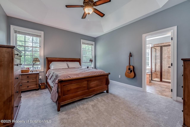 268 Winship Rd, Covington Twp, PA 18444 - bedroom featuring carpet flooring, connected bathroom, a ceiling fan, and a raised ceiling