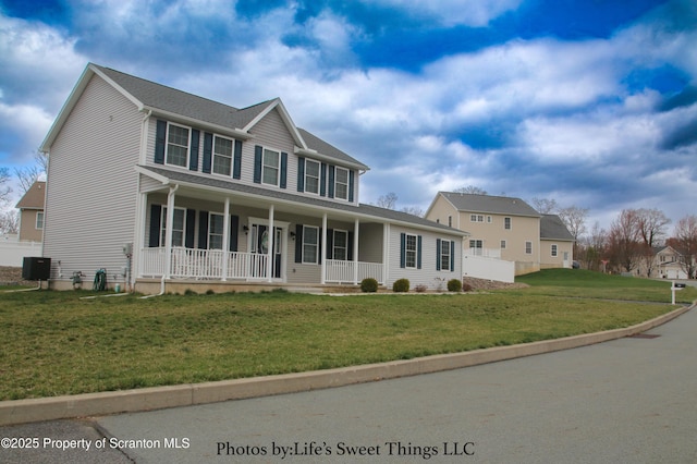 525 Poppy Ln, Moosic, PA 18507 - colonial house with covered porch and a front yard