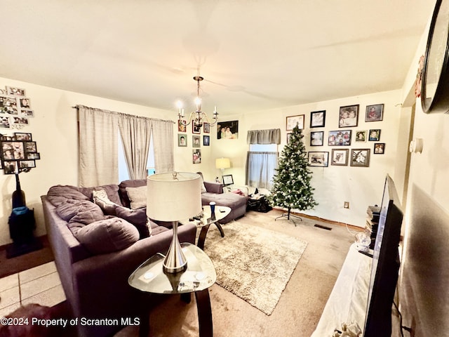 living room featuring a notable chandelier