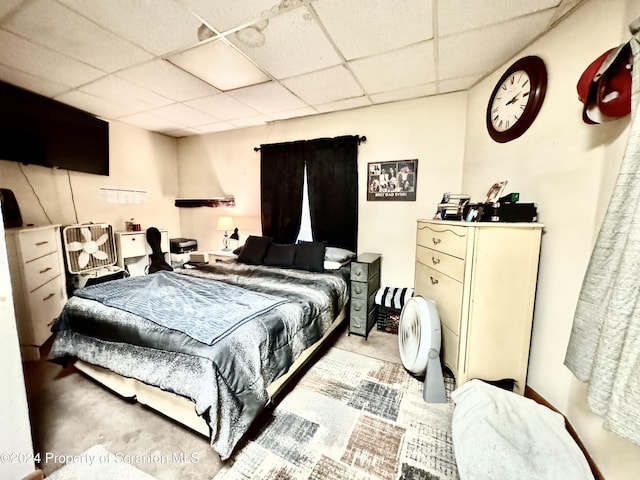 bedroom featuring a drop ceiling