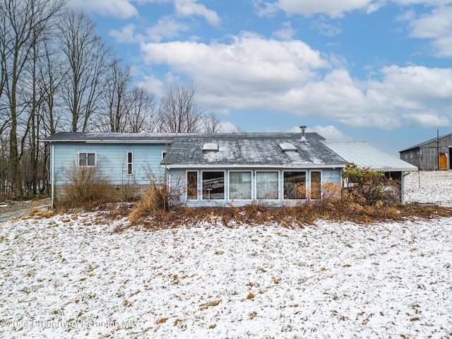 view of snow covered property