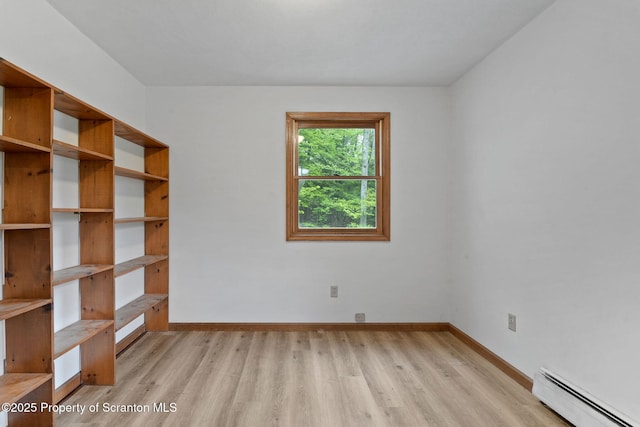 67 Smith Dr, Hallstead, PA 18822 - empty room with baseboard heating, light wood-style flooring, and baseboards