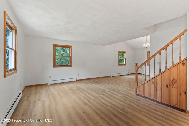 67 Smith Dr, Hallstead, PA 18822 - unfurnished living room with a baseboard radiator, a baseboard heating unit, light wood-style floors, stairway, and lofted ceiling