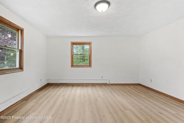 67 Smith Dr, Hallstead, PA 18822 - spare room with light wood-style flooring, baseboards, and baseboard heating