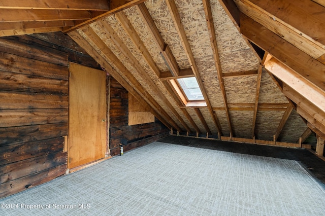 view of unfinished attic