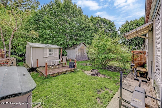 942 Providence Rd, Scranton, PA 18508 - view of yard with an outdoor fire pit and a wooden deck