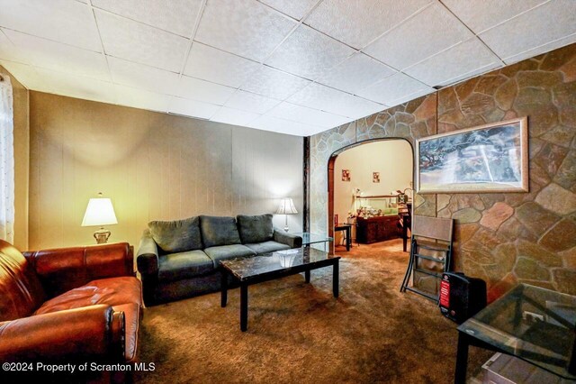 942 Providence Rd, Scranton, PA 18508 - living area featuring arched walkways, carpet floors, and a paneled ceiling