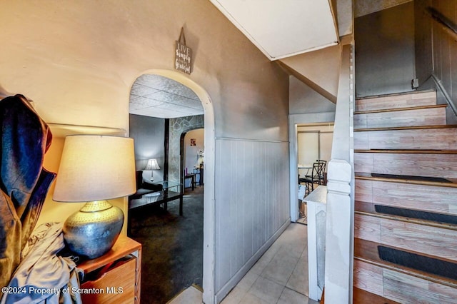 942 Providence Rd, Scranton, PA 18508 - stairs featuring arched walkways, a wainscoted wall, and wood walls