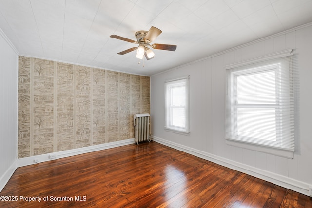 81 Rees St, Wilkes-Barre, PA 18702 - spare room with radiator heating unit, hardwood / wood-style floors, ornamental molding, a ceiling fan, and baseboards