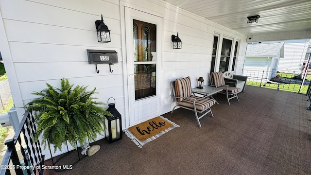 entrance to property with a porch
