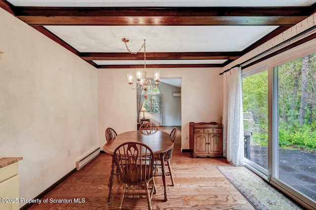 dining room with a baseboard radiator, light hardwood / wood-style flooring, plenty of natural light, and a notable chandelier