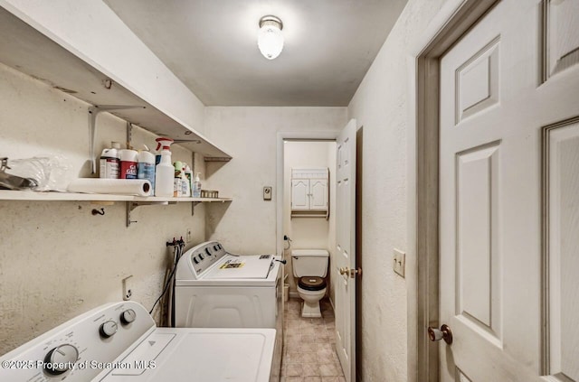 washroom featuring separate washer and dryer