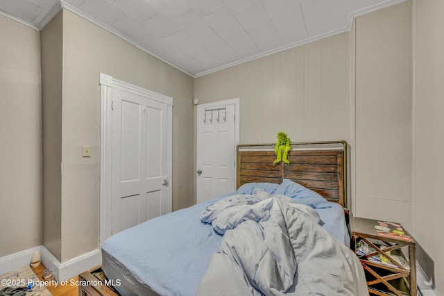 bedroom with crown molding