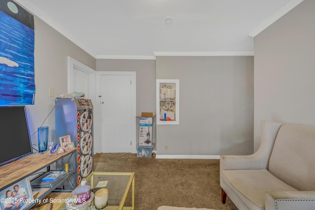 sitting room featuring carpet and crown molding