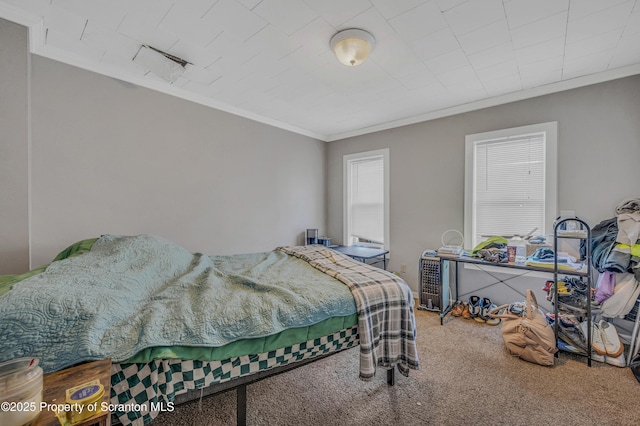 bedroom featuring carpet floors and ornamental molding