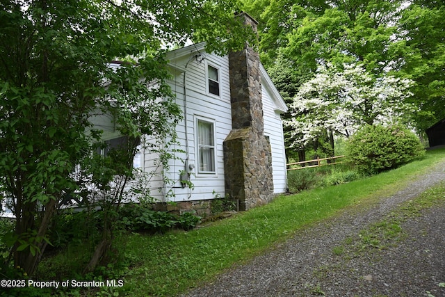 519 Sutton Rd, New Milford, PA 18834 - view of side of property with a chimney