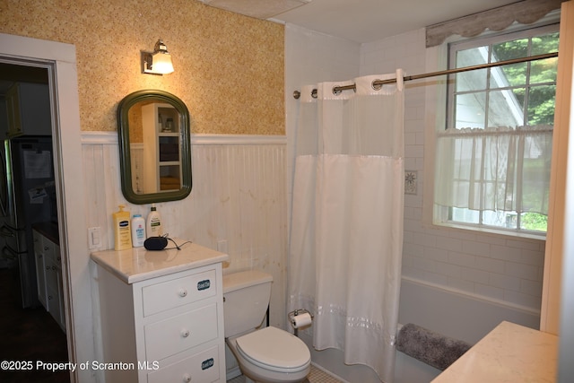 519 Sutton Rd, New Milford, PA 18834 - full bath with a wainscoted wall, shower / bath combination with curtain, and toilet