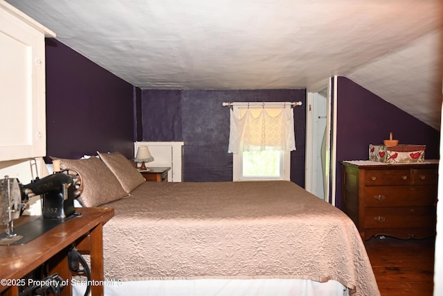 519 Sutton Rd, New Milford, PA 18834 - bedroom with wood finished floors and lofted ceiling