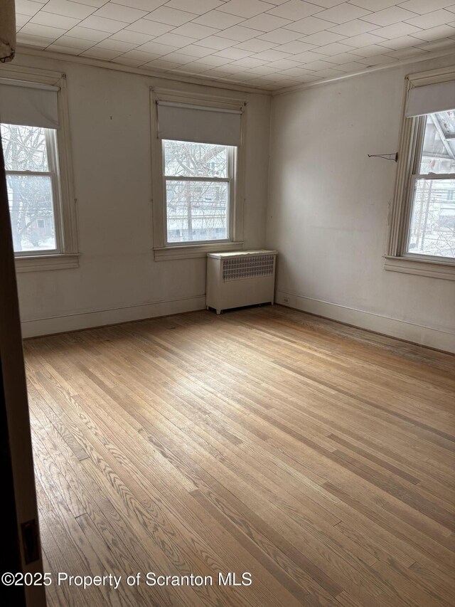 bathroom featuring toilet and plus walk in shower