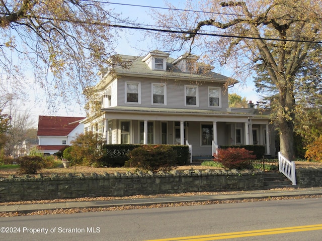 view of front facade featuring covered porch