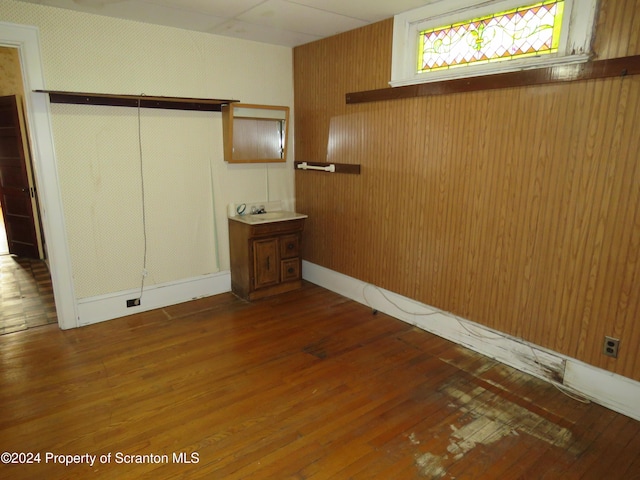 empty room with wood-type flooring