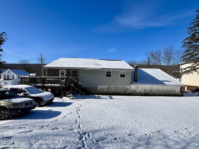 view of front of house with a deck