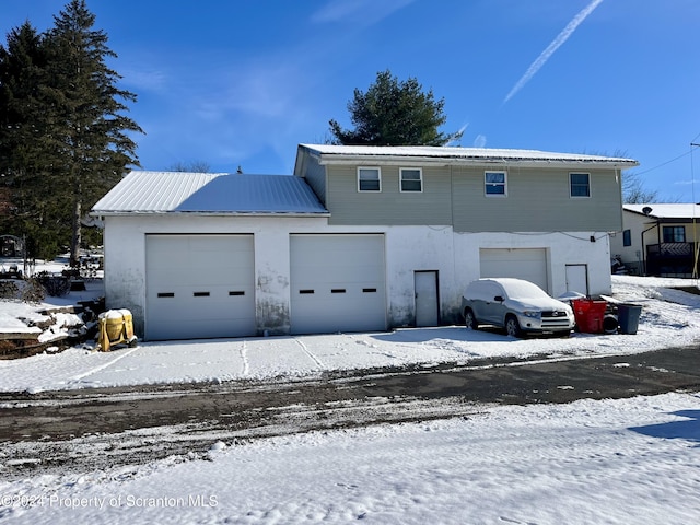 exterior space with a garage