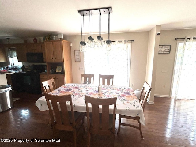 85 Cranberry Ter, Duryea, PA 18642 - dining area with dark wood-style flooring and plenty of natural light