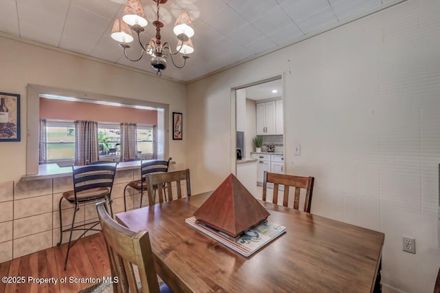 dining room featuring a chandelier